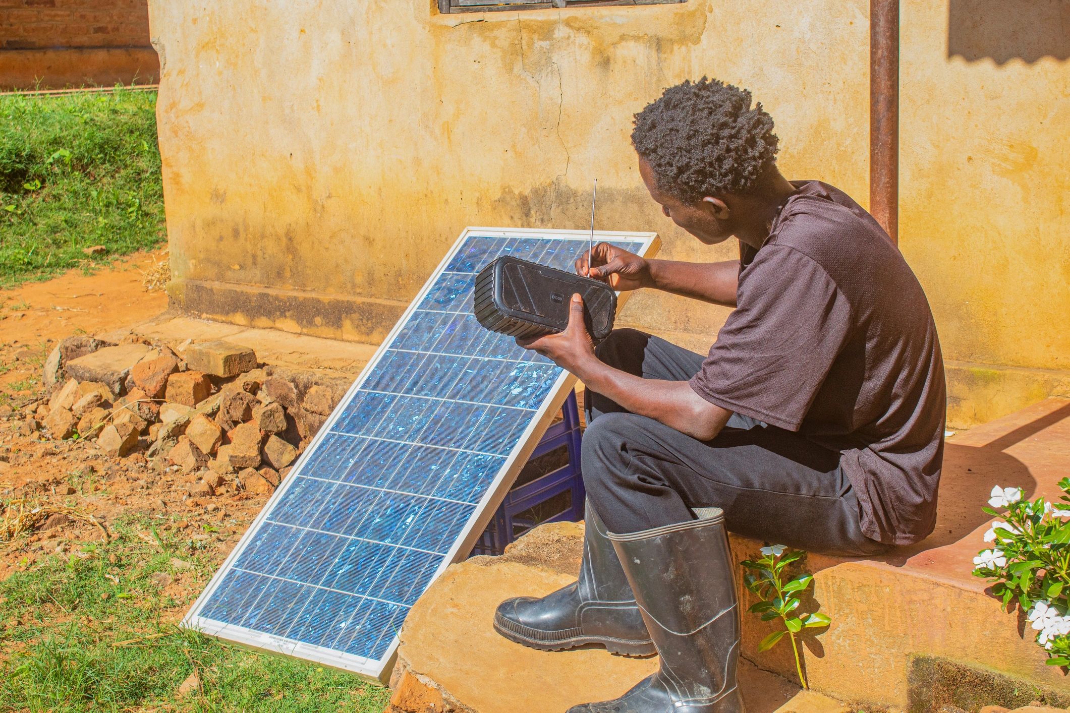Technician working with solar-powered equipment