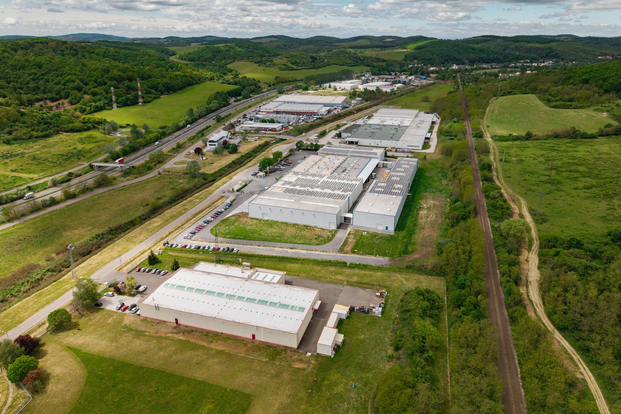 Large industrial warehouse complex representing supply and logistics